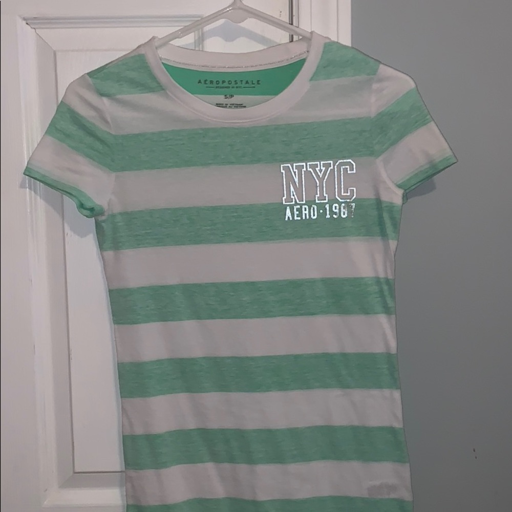 green and white tee shirt